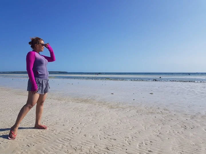 A girl standing in the beach of Bantayan